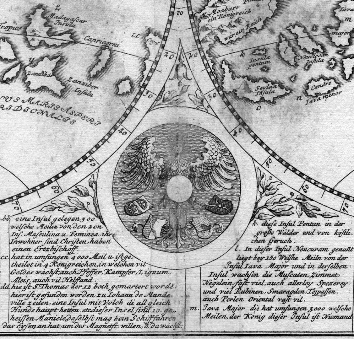 Landkarte und Inschriften auf dem Globus des Martin Behaim (noch ohne Amerika) Detailansicht mit dem Jungfrauenadler und den Wappen auf der Unterseite vom Behaim-Globus. Wappen von links nach rechts: Volckamer, Behaim, Nützel, Holzschuher und Groland