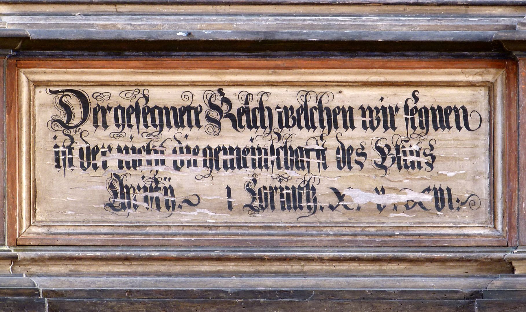 Flötner Altar (Ansbach) Inschrift aus Korinther 10,16 erster Satz: Ist der Kelch des Segens, über den wir den Segen sprechen, nicht Teilhabe am Blut Christi? (Ist das Brot, das wir brechen, nicht Teilhabe am Leib Christi?)