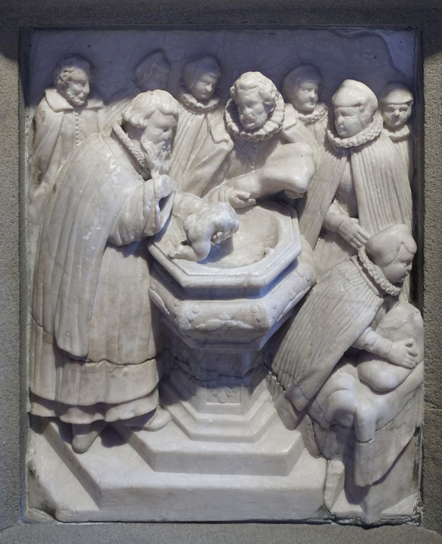 Marmorreliefs eines Taufsteins Marmorrelief / Position 3 / Vorgang einer Taufe in zeitgenössischer Darstellung des Jahres 1615seitliches Knorpelwerk, oberer Abschluss