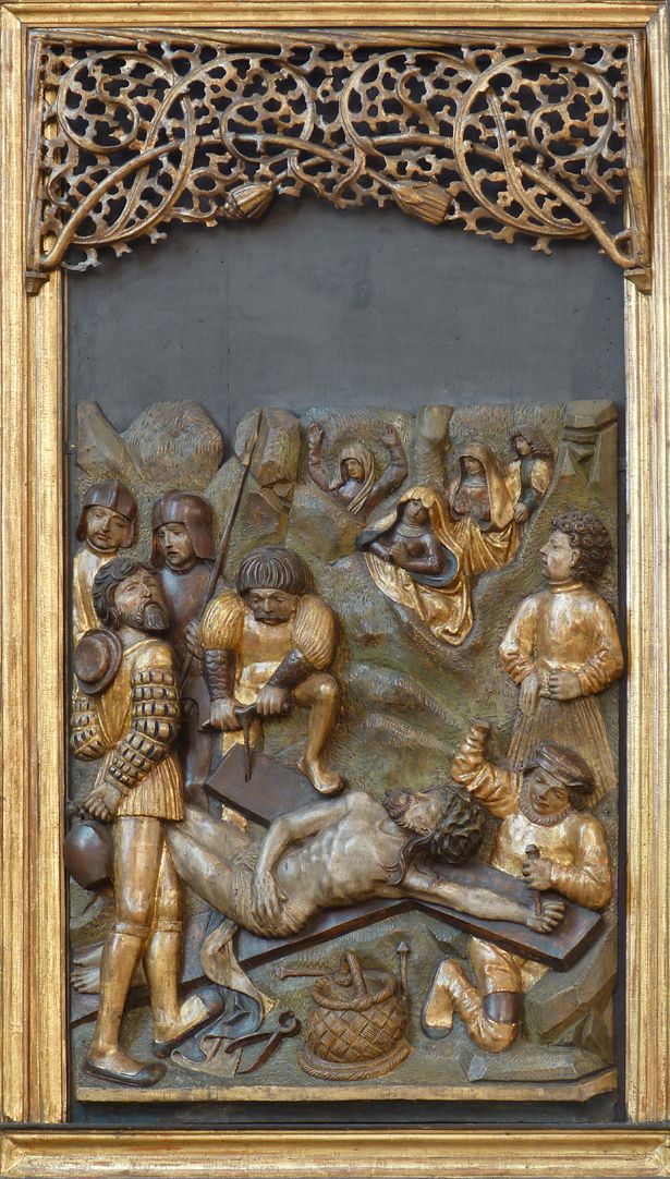 Kreuzaltar rechter Flügel unten: Annagelung an das Kreuz. Als Vorlage diente der um 1509 entstandene Holzschnitt aus Dürers „kleiner Holzschnittpassion“